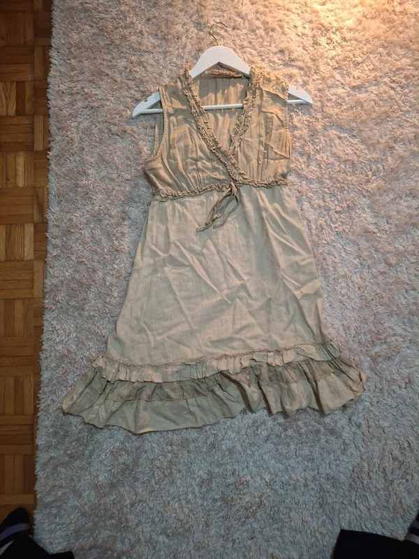 Phone photo of a linen mini dress